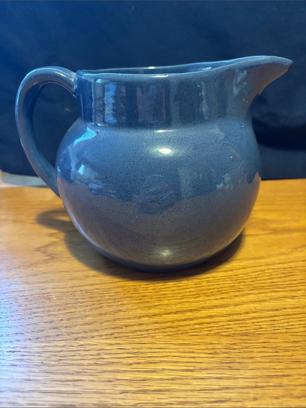 Vintage Blue Ceramic Pitcher. It looks like KK etched in bottom.